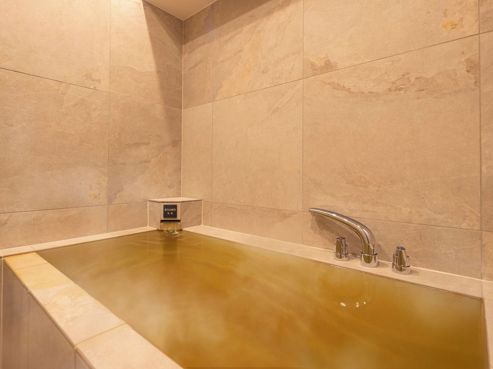 [金泉かけ流し] プレミアム和洋室 (コーナービュー) 禁煙 バスルーム0 | 亀の井ホテル 有馬