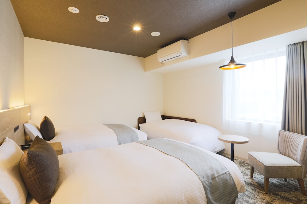 【禁煙】デラックスツインルーム/26㎡/120 ㎝ 幅ベッド2台+EXベッド/3名迄 客室4 | KOKO HOTEL 札幌すすきの