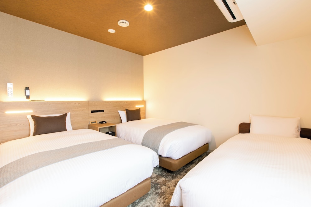 【禁煙】デラックスツインルーム/26㎡/120 ㎝ 幅ベッド2台+EXベッド/3名迄 客室5 | KOKO HOTEL 札幌すすきの