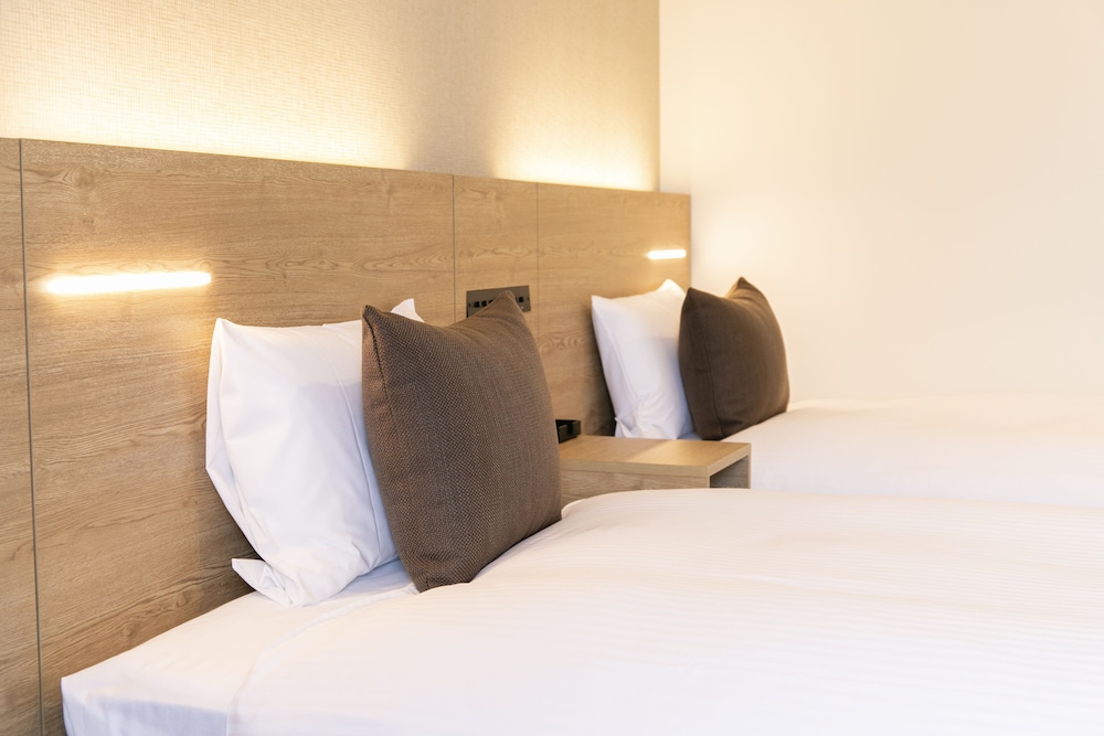 【禁煙】ハリウッドツインルーム/16㎡/110 ㎝ 幅ベッド2台/2名迄 客室2 | KOKO HOTEL 札幌すすきの