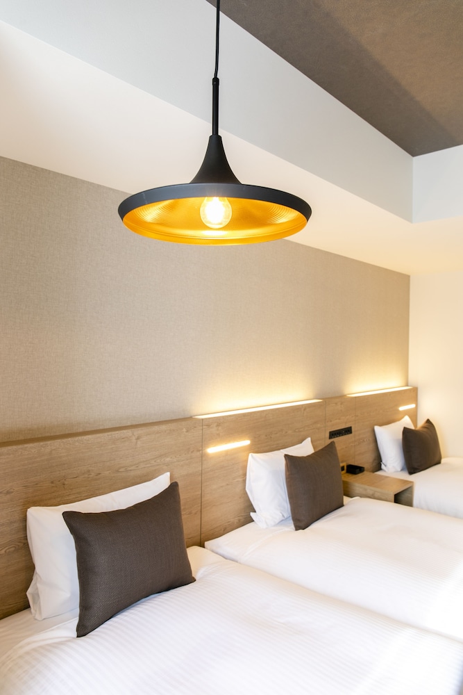 【禁煙】モデレートツインルーム/26㎡/110 ㎝ 幅ベッド2台+EXベッド/3名迄 客室3 | KOKO HOTEL 札幌すすきの