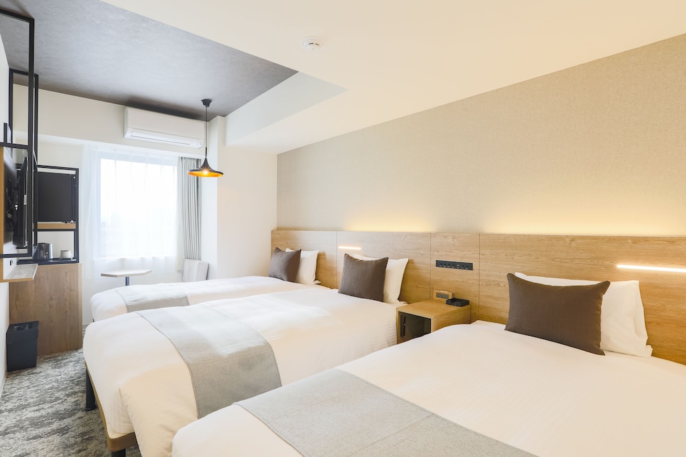 【禁煙】モデレートツインルーム/26㎡/110 ㎝ 幅ベッド2台+EXベッド/3名迄 | KOKO HOTEL 札幌すすきの