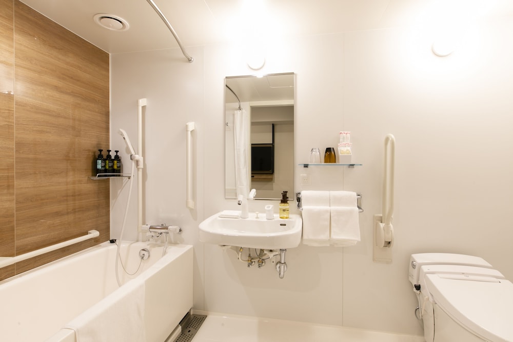 【禁煙】ユニバーサルツインルーム/26㎡/120 ㎝ 幅ベッド2台/2名迄 バスルーム0 | KOKO HOTEL 札幌すすきの