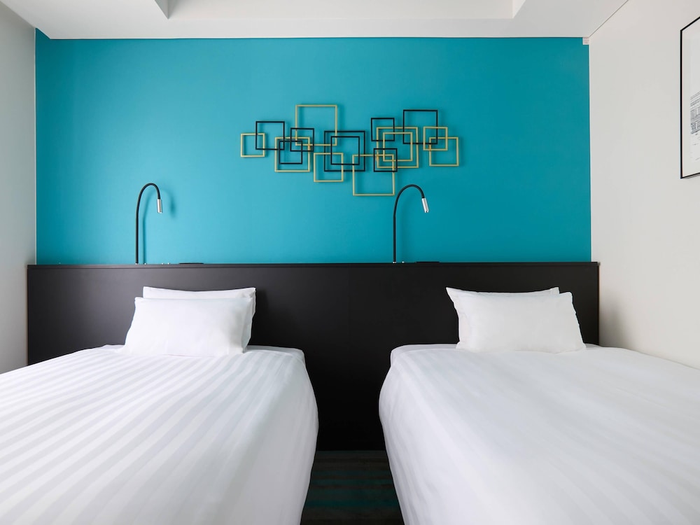 デラックス ルーム シングルベッド 2 台 禁煙 | HOTEL GEOMETIQ Osaka Umeda, an Ascend Collection Hotel