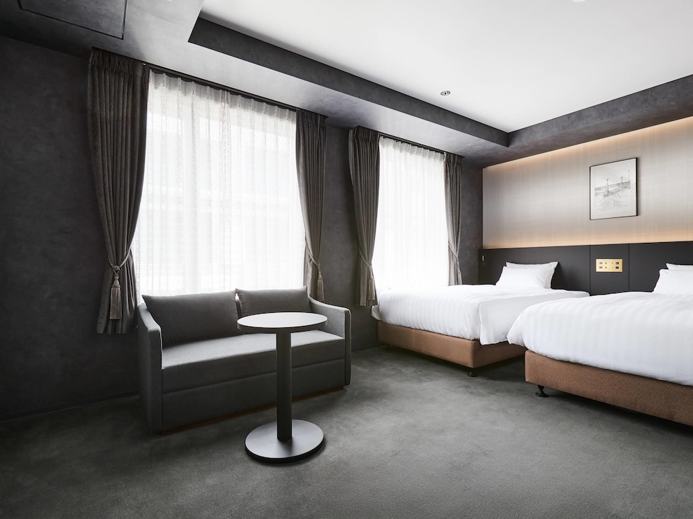 エグゼクティブ ルーム シングルベッド 2 台 禁煙 | HOTEL GEOMETIQ Osaka Umeda, an Ascend Collection Hotel