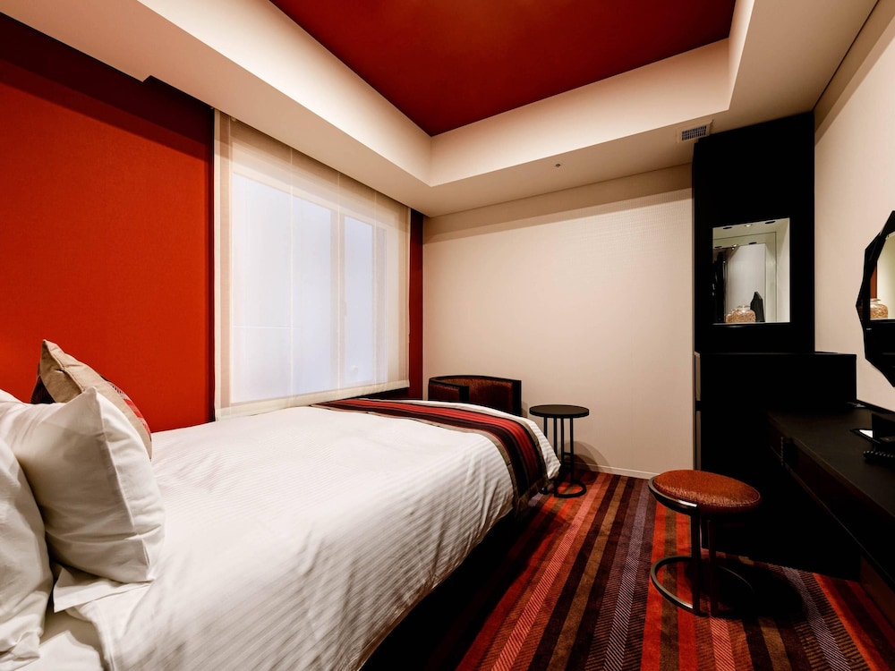 デラックス ルーム ダブルベッド 1 台 禁煙 客室1 | HOTEL GEOMETIQ Osaka Umeda, an Ascend Collection Hotel