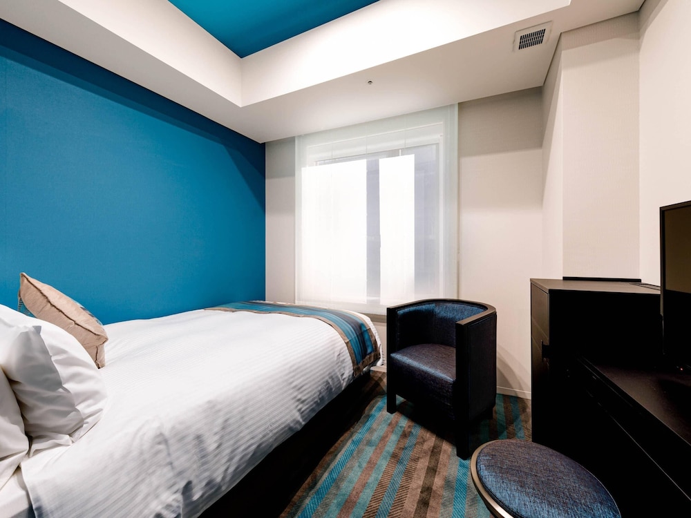 デラックス ルーム ダブルベッド 1 台 禁煙 | HOTEL GEOMETIQ Osaka Umeda, an Ascend Collection Hotel