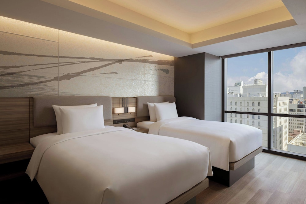 スイート ダブルベッド 2 台 コーナー | コートヤード・バイ・マリオット大阪本町