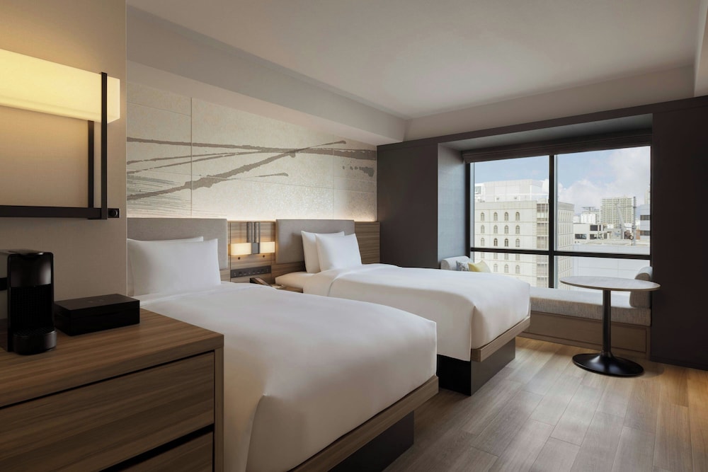 エリート ルーム シングルベッド 2 台 コーナー (Collaboration Doubles) | コートヤード・バイ・マリオット大阪本町