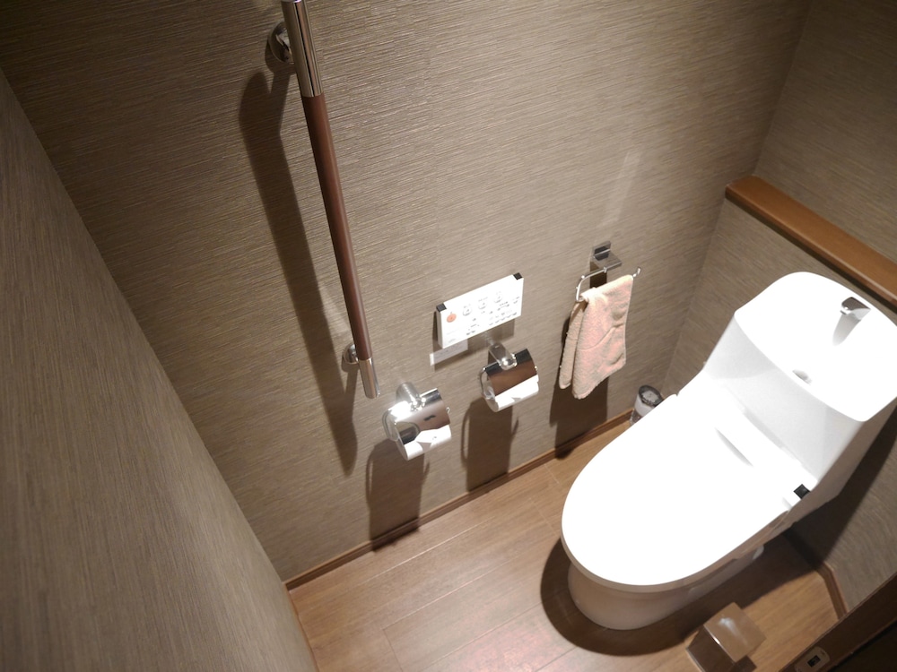 [オホーツク倶楽部 露天風呂付DXツイン/海側] 120cm幅ベッド2台+EXベッド/50sqm/3名迄/禁煙 客室1 | 北こぶし 知床 ホテル＆リゾート