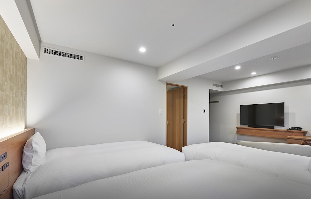 デラックス ツインルーム 禁煙 客室2 | ダイワロイネットホテル横浜公園