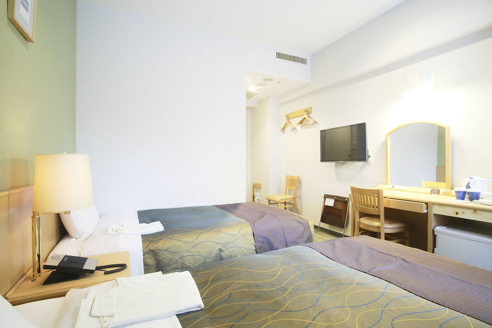 ツインルーム シングルベッド 2 台 禁煙 客室1 | ホテル グランド シティ