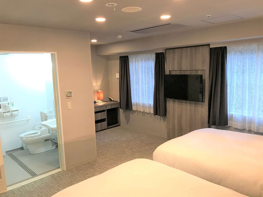 プレミア ツインルーム シングルベッド 2 台 禁煙 客室1 | ベストウェスタンホテルフィーノ大阪心斎橋