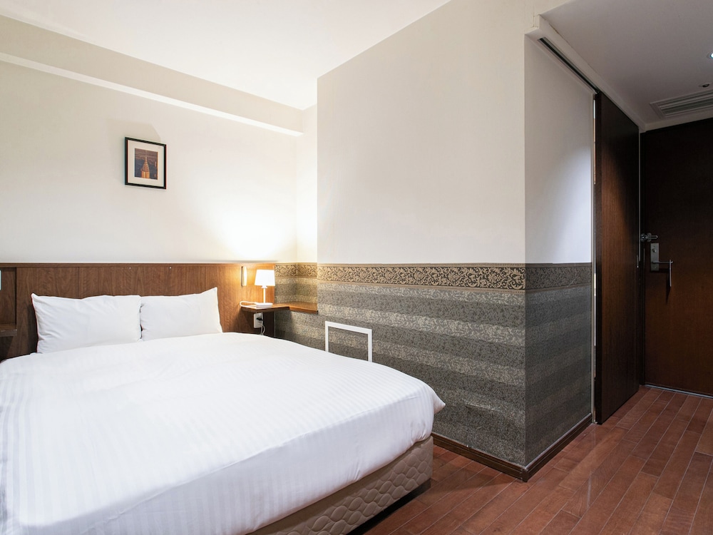 スタンダード ダブルルーム ダブルベッド 1 台 禁煙 客室7 | サットンホテル博多シティ