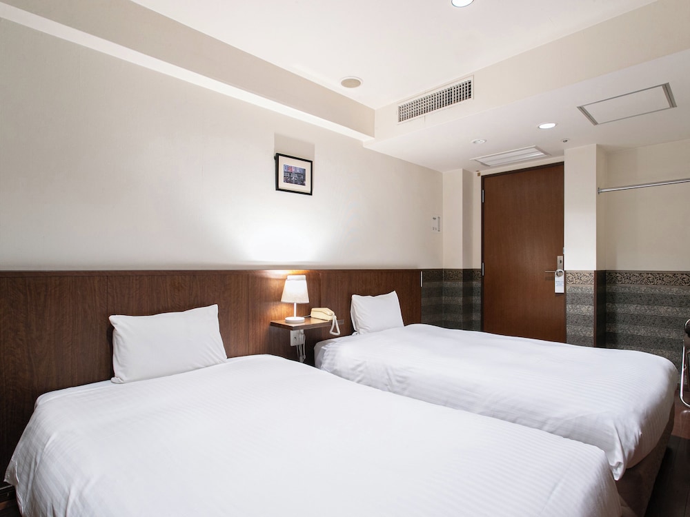 スーペリア ツインルーム シングルベッド 2 台 禁煙 | サットンホテル博多シティ