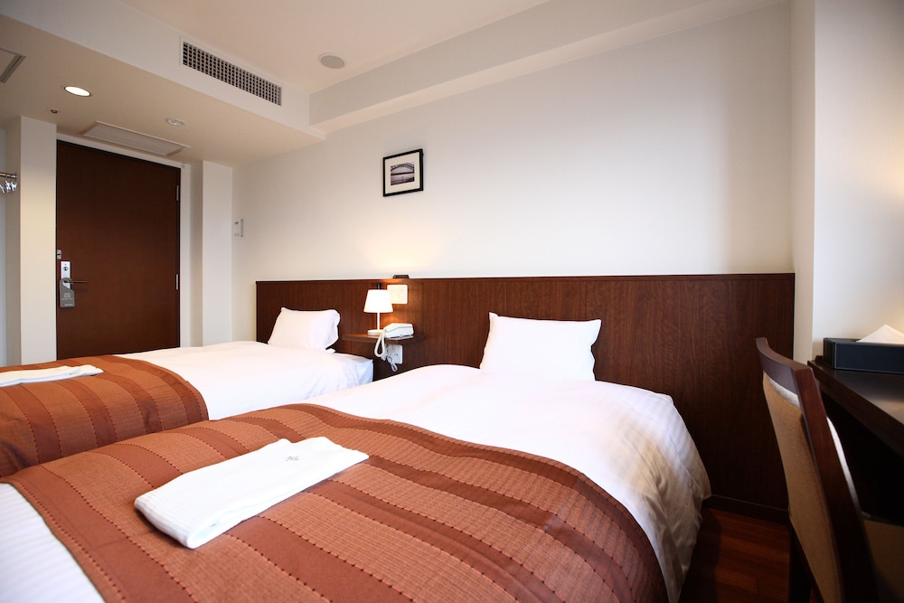 スーペリア ツインルーム シングルベッド 2 台 禁煙 客室2 | サットンホテル博多シティ
