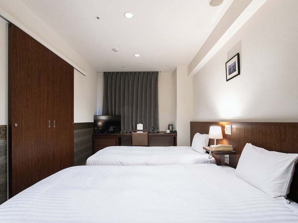 スーペリア ツインルーム シングルベッド 2 台 禁煙 客室7 | サットンホテル博多シティ