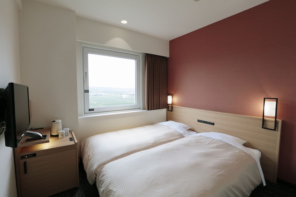 ツインルーム シングルベッド 2 台 禁煙 客室1 | カンデオ ホテルズ大津熊本空港