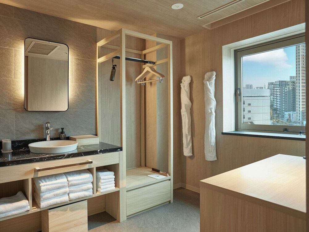 ラグジュアリーフロア デラックスツイン (2ダブルベッド) 2~5名 禁煙 客室1 | ワン・ステーションホテル熊本