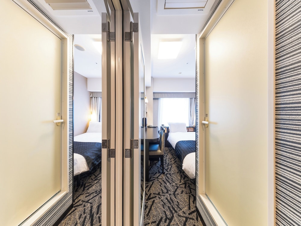 [シングル×シングル] コネクトルーム22㎡ 1-2名 [禁煙室] 客室1 | アパホテル〈淀屋橋駅前〉