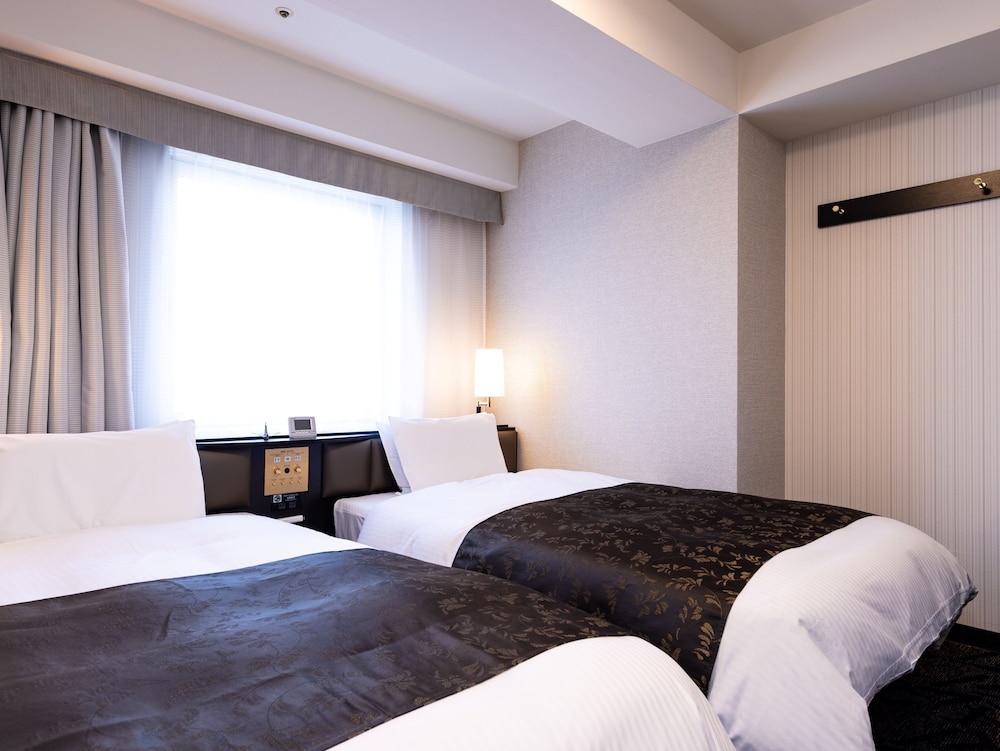 ツインルーム シングルベッド 2 台 喫煙可 | アパホテル〈福井片町〉