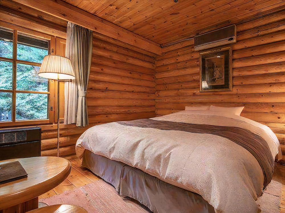 【大型コテージの 1 部】キングベッドルーム・禁煙<1 部屋 ベッド 1 台> | ホテル ニドム