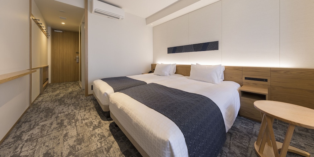 スーペリア ツインルーム 禁煙 / 洗濯乾燥機付き 客室4 | 東急ステイ飛騨高山 結の湯