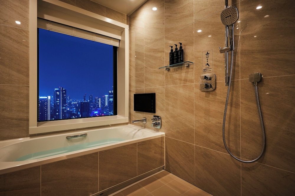 エグゼクティブフロア コーナーデラックス キングルーム (エグゼクティブラウンジアクセス付) 60平方メートル 禁煙 バスルーム1 | ザ ロイヤルパークホテル アイコニック 大阪御堂筋