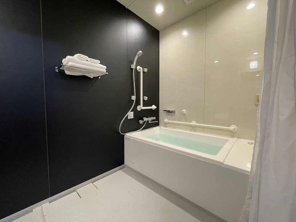 スタンダード ルーム ダブルベッド 1 台 バリアフリー バスルーム0 | ゾンク中洲