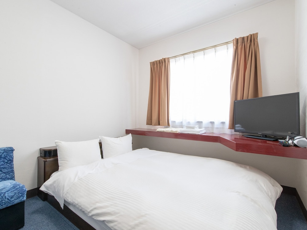 ダブルルーム 禁煙 | Tabist レイズホテルすいせん