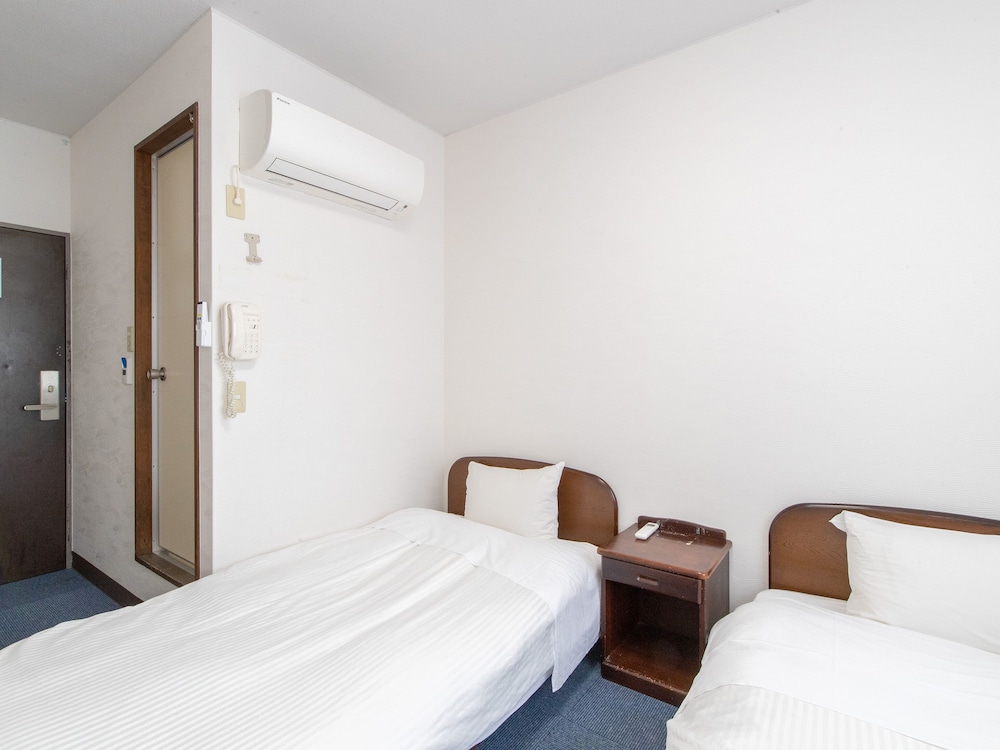 ツインルーム 禁煙 客室7 | Tabist レイズホテルすいせん