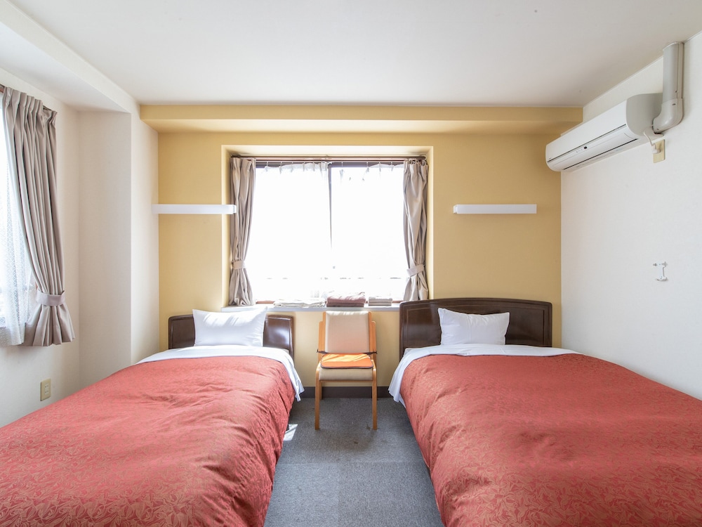 ツインルーム 客室9 | Tabist レイズホテルやかた