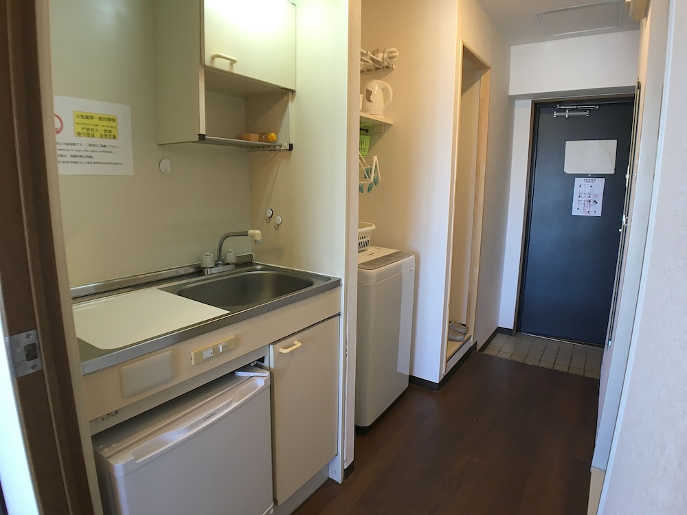 アパートメント ダブルベッド 1 台 バルコニー シティビュー (504) 専用キッチン0 | COCO Fukuoka Chiyo