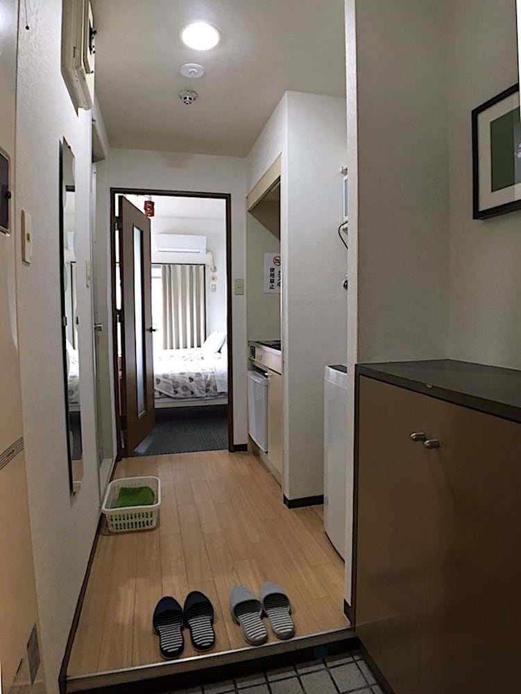 アパートメント シングルベッド 2 台 バルコニー シティビュー (502) 客室1 | COCO Fukuoka Chiyo