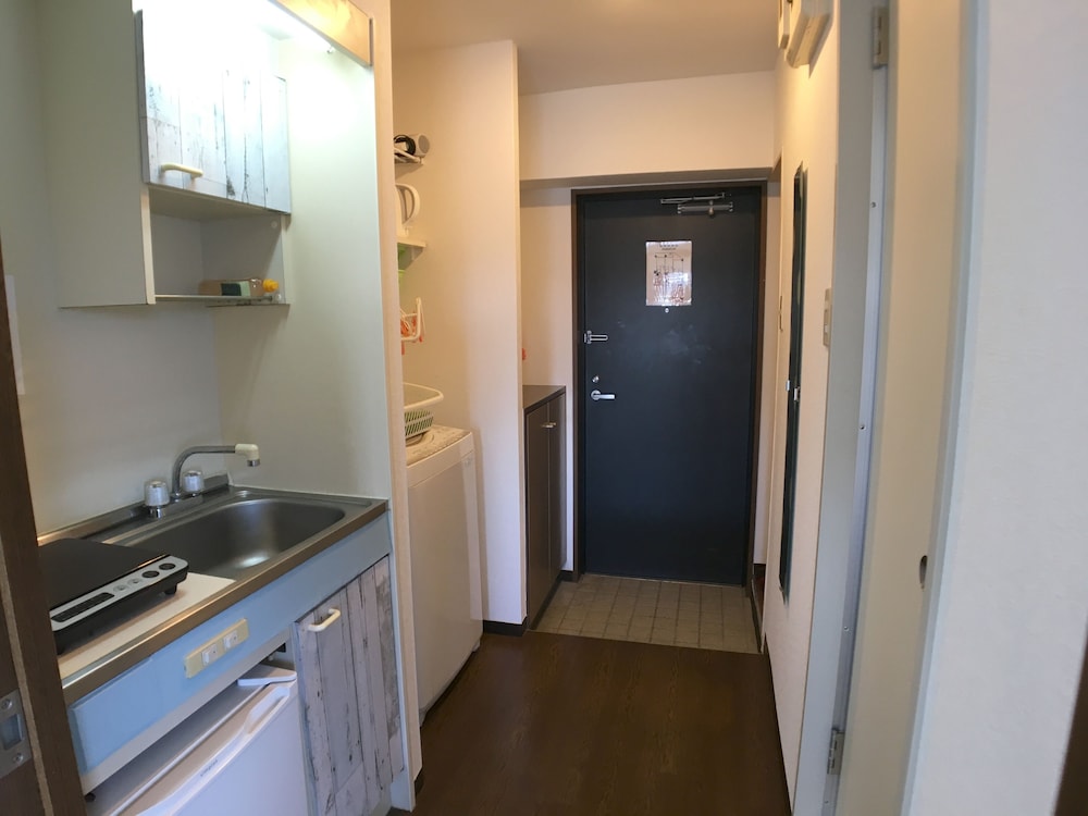 アパートメント シングルベッド 2 台 バルコニー シティビュー (502) 専用キッチン0 | COCO Fukuoka Chiyo