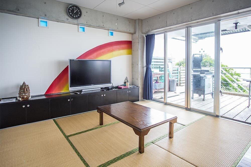 一棟貸し オーシャンビュー リビング エリア0 | 貸別荘 海燕