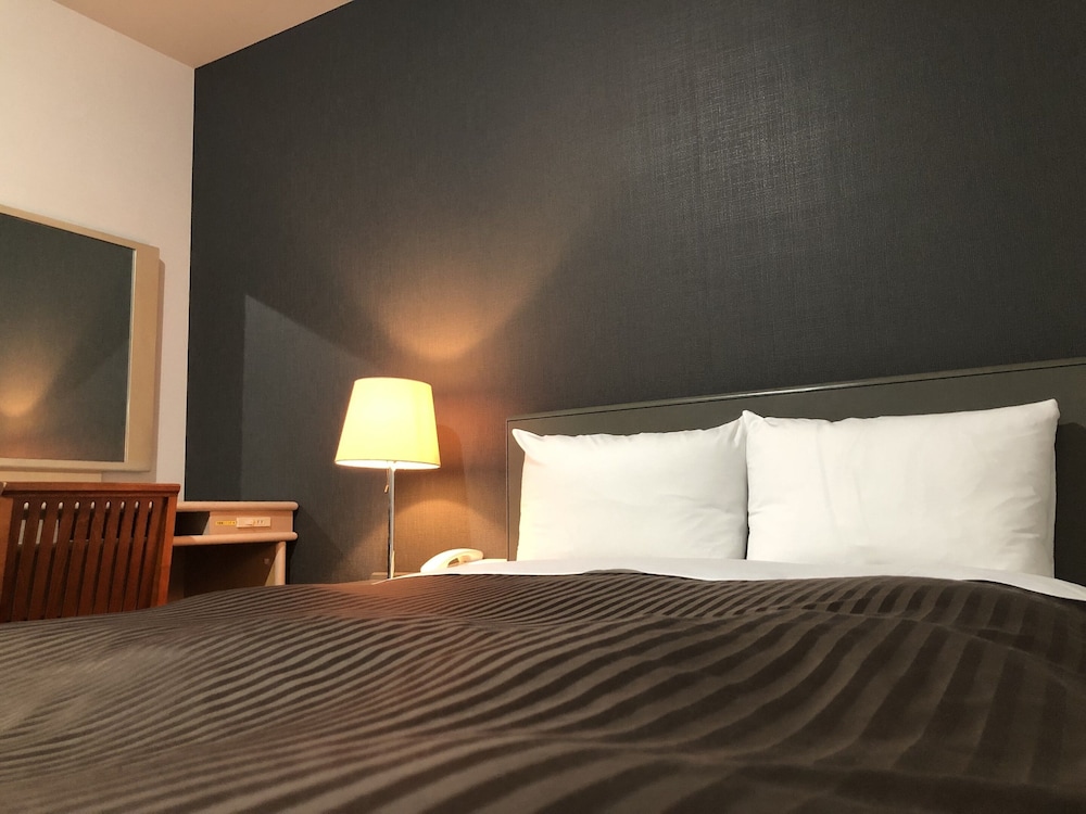 エコノミー ダブルルーム 喫煙可 客室1 | ホテル ニューホワイトハウス