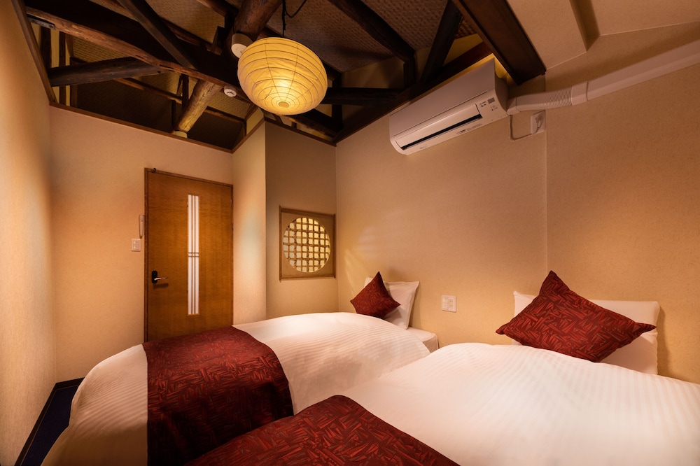 京町家一棟貸 客室3 | 紡 堀川吉文字