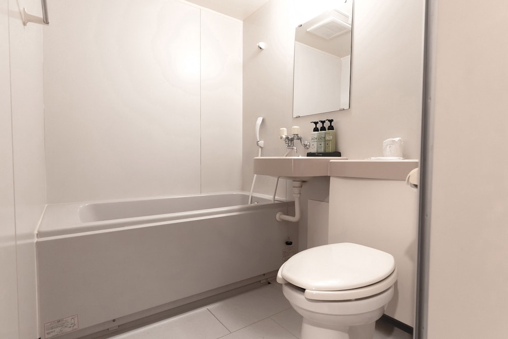 ツインルーム 喫煙可 バスルーム0 | Tabist 観光ビジネスホテル松山 飛騨高山