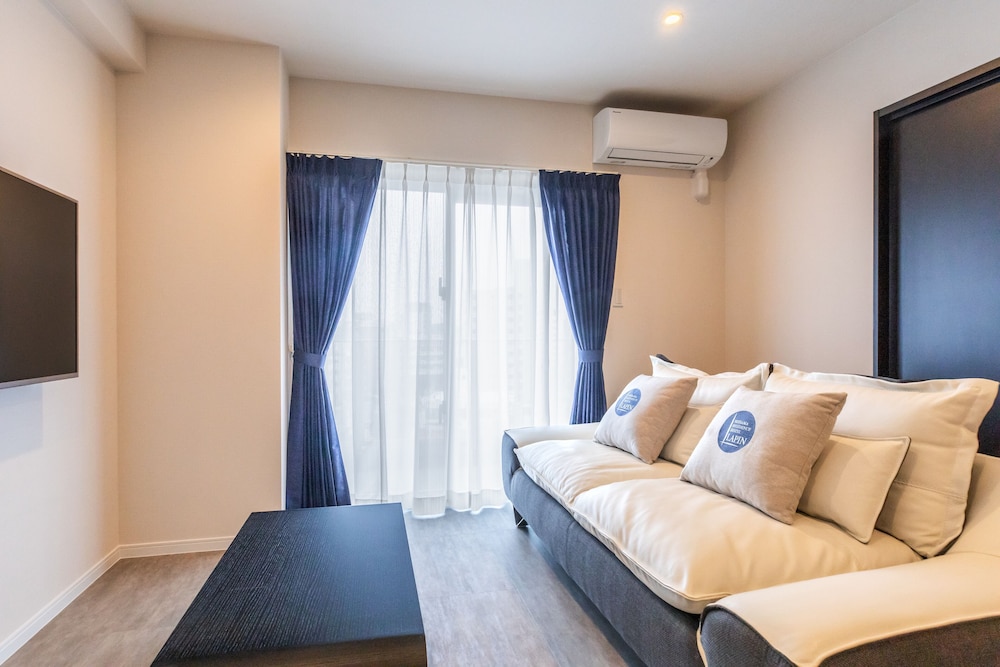 スタンダード ルーム リビング エリア4 | ラパン ミハマ レジデンスホテル