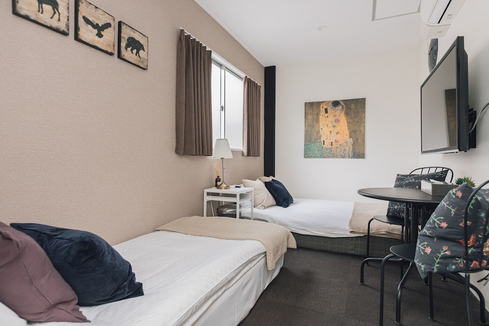 ダブルルーム エキストラベッド付 客室4 | Namba Garden Square AFP Apartment Hotel