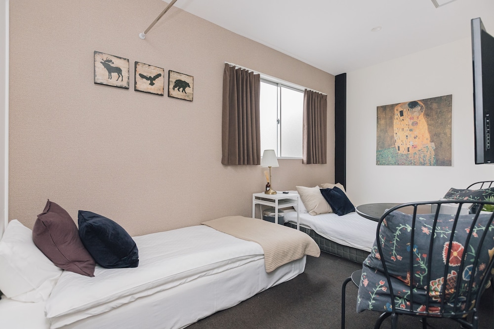 ダブルルーム エキストラベッド付 客室7 | Namba Garden Square AFP Apartment Hotel