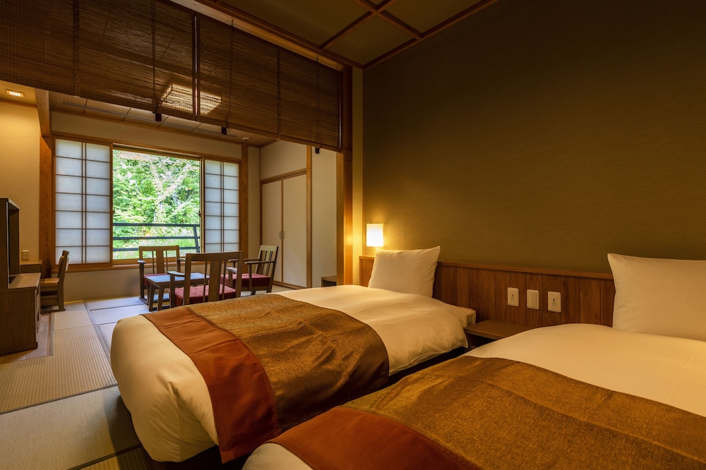 (雲の坐) 和洋室 天然温泉露天風呂付 ２階 | 湯けむりの宿 稲住温泉