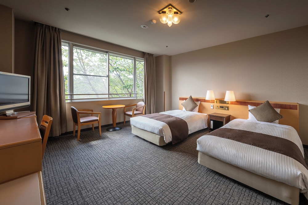 洋室ツイン (バス付) 禁煙 客室2 | 亀の井ホテル 富田林