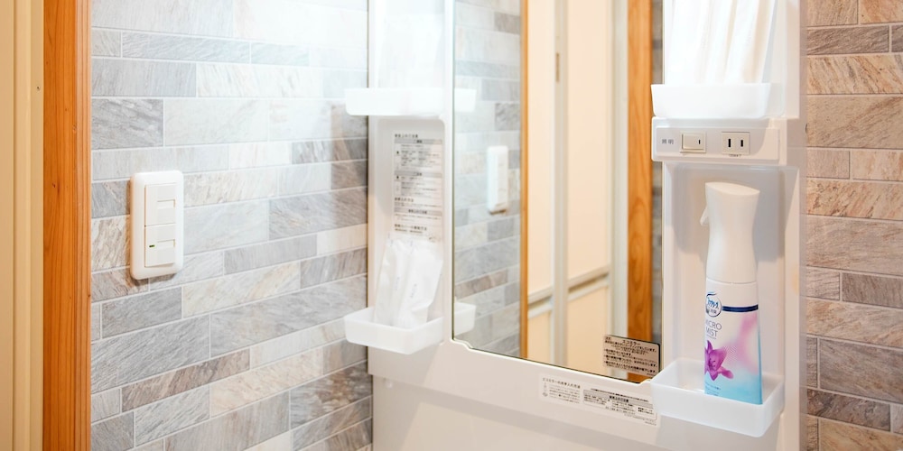 スタンダード ファミリールーム 101 バスルームの設備3 | Mcity in Furujima