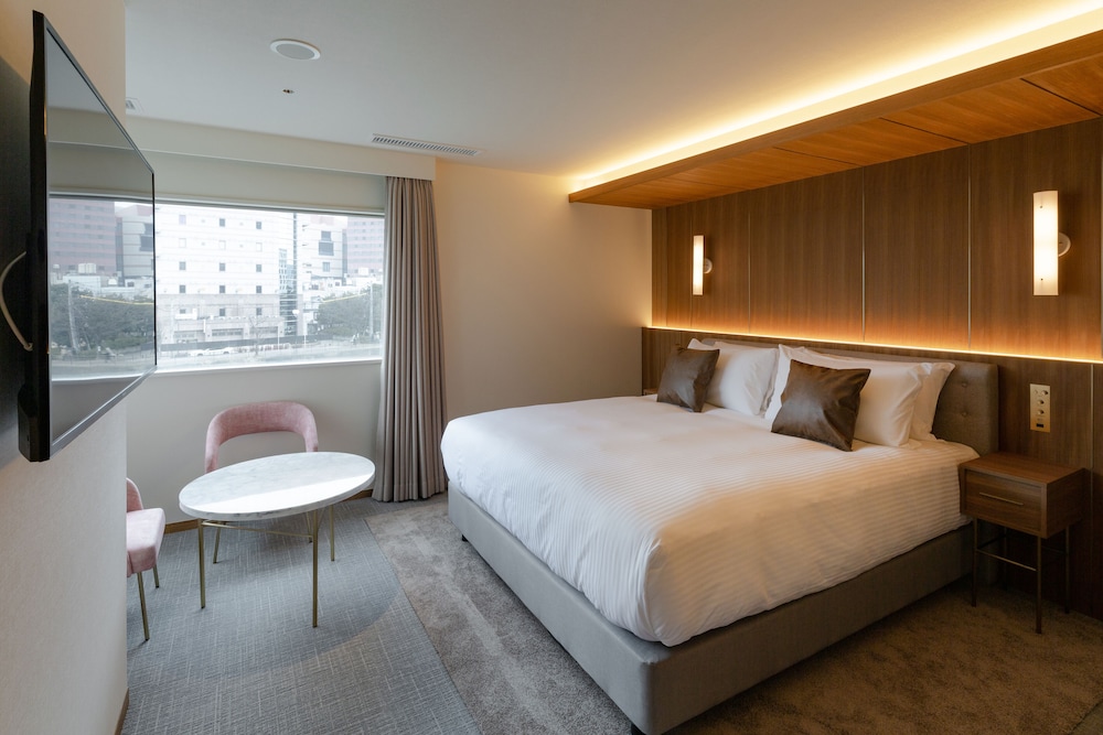 デラックスキングルーム リバービュー 禁煙 客室2 | ザ・ワンファイブ ヴィラ 福岡