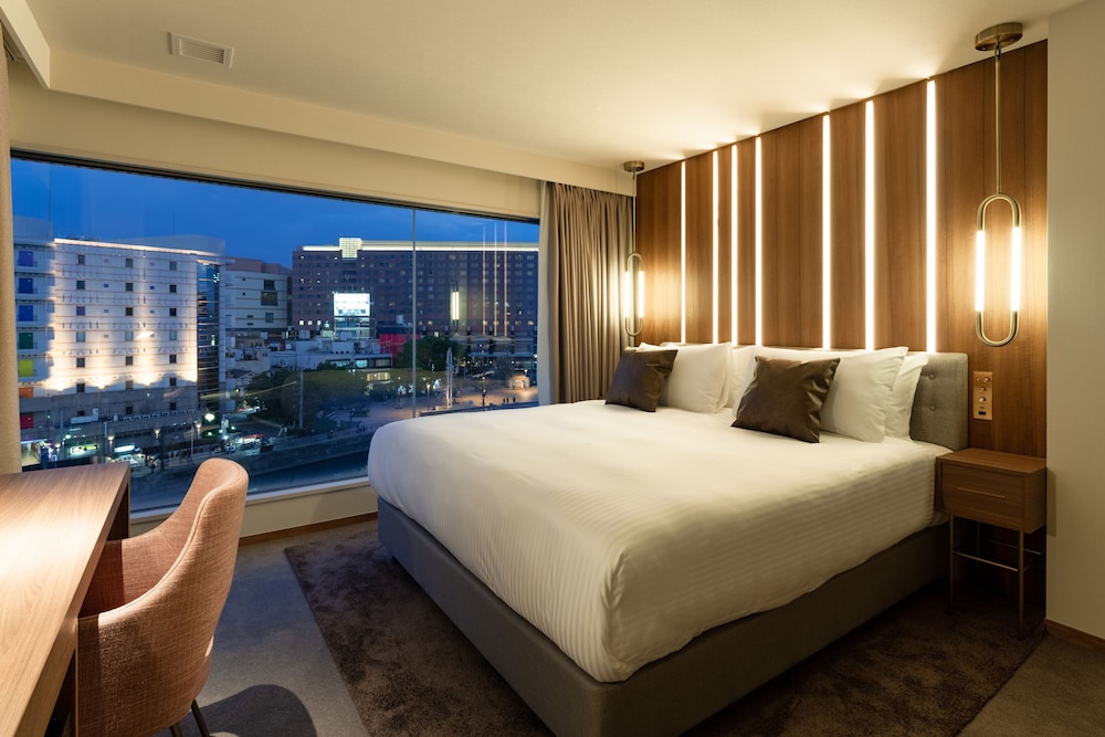 デラックスキングルーム リバービュー 最上階 禁煙 客室1 | ザ・ワンファイブ ヴィラ 福岡