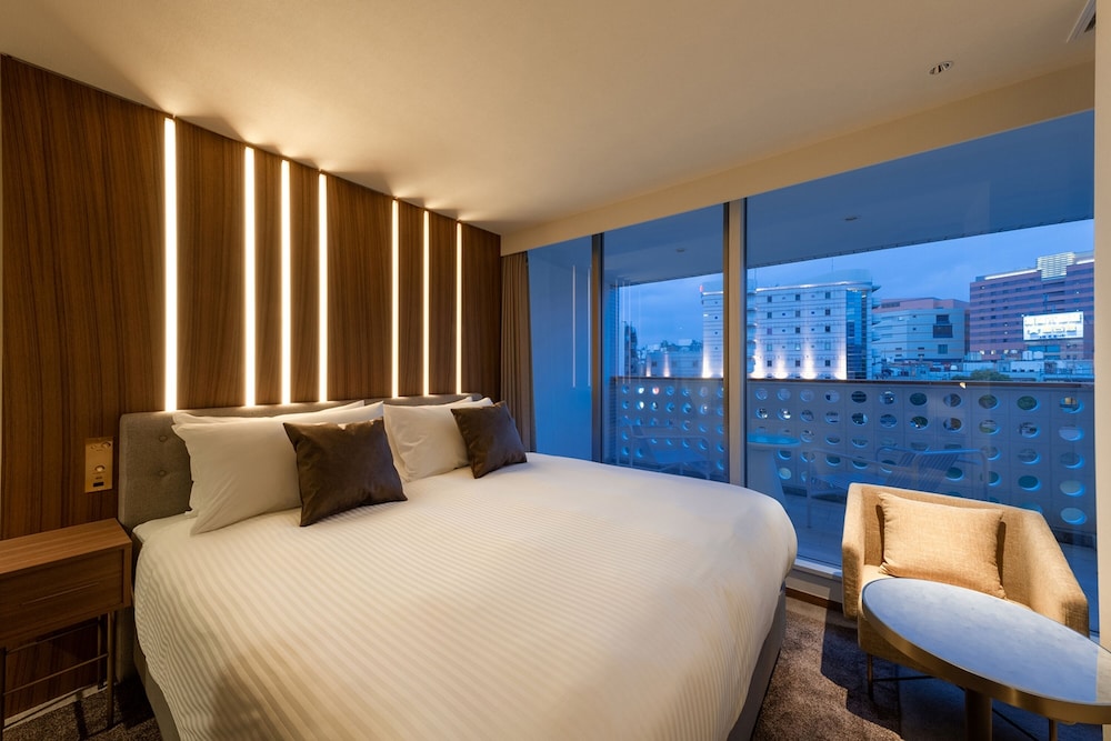 デラックスキングルーム リバーサイドバルコニー付き 禁煙 | ザ・ワンファイブ ヴィラ 福岡