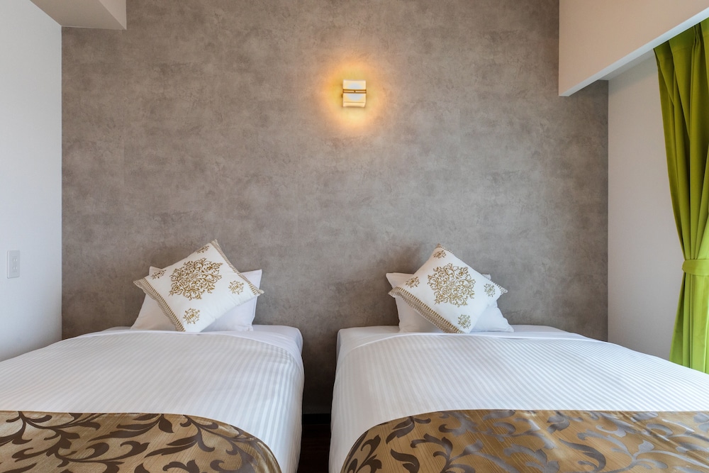 客室1 | Mr.KINJO in front of Manza Beach 客室1 | Mr.KINJO in front of Manza Beach