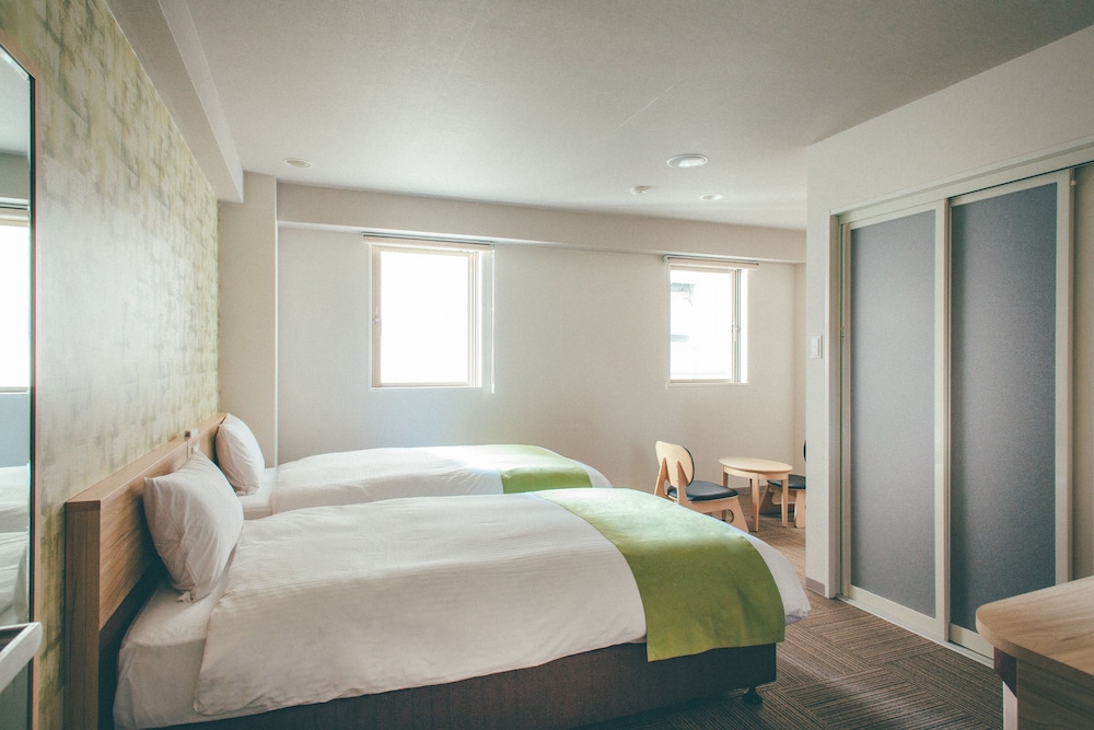 デラックス ツインルーム 喫煙可 客室10 | くれたけイン プレミアム大垣駅前